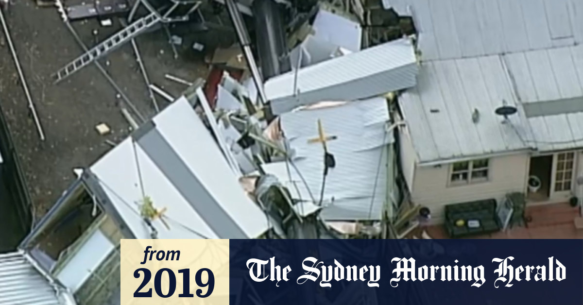 Video Crane falls on house